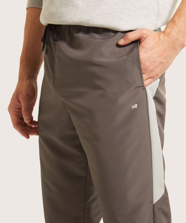 Pantalón Jogger Plano Unicolor Con Cortes Contraste, Bolsillos Laterales, Cordón Ajustable Y Elástico Interno, Sport Líneas image number null