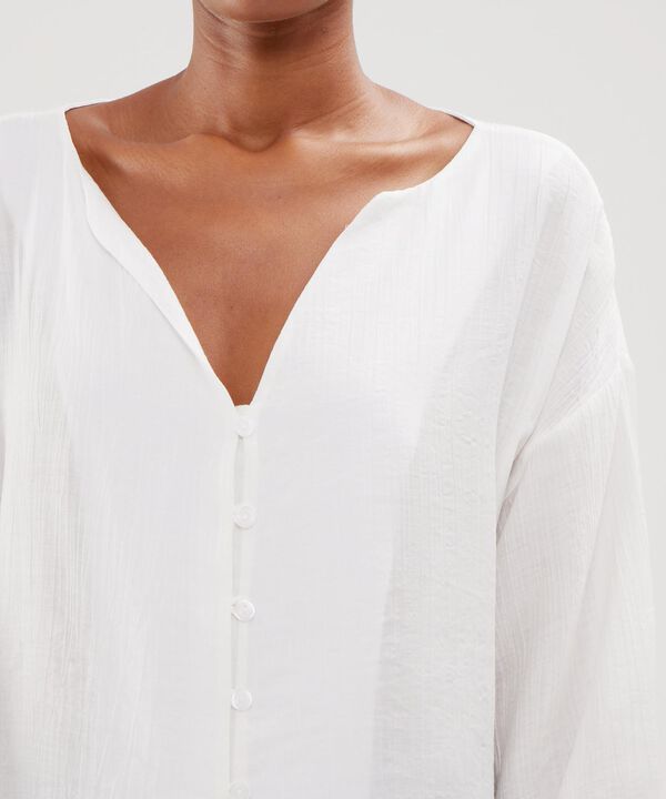 Blusa Unicolor Textura Manga Larga Con Anudado Y Botonadura En Frente image number null